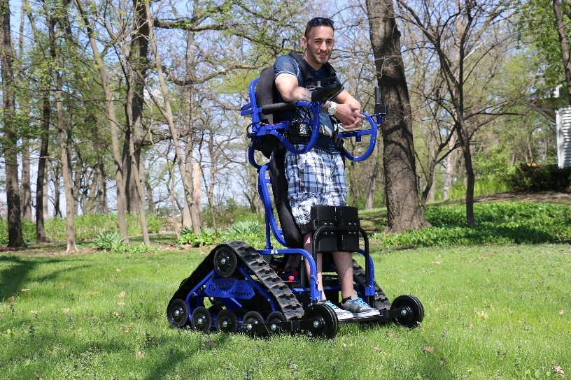 Man in standing off-road wheelchair