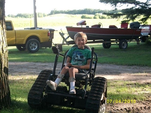 Boy in off-road wheelchair