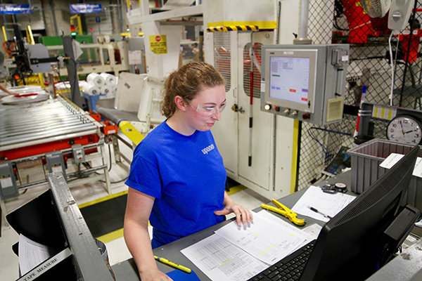 Uponor employee working on shop floor