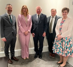 A picture of Governor Walz, Commissioner Varilek, Minnesota Department of Agriculture Commissioner Thom Petersen and Deputy Commissioner McKinnon standing with Her Excellency Kirsten Hillman, Ambassador of Canada to the U.S.